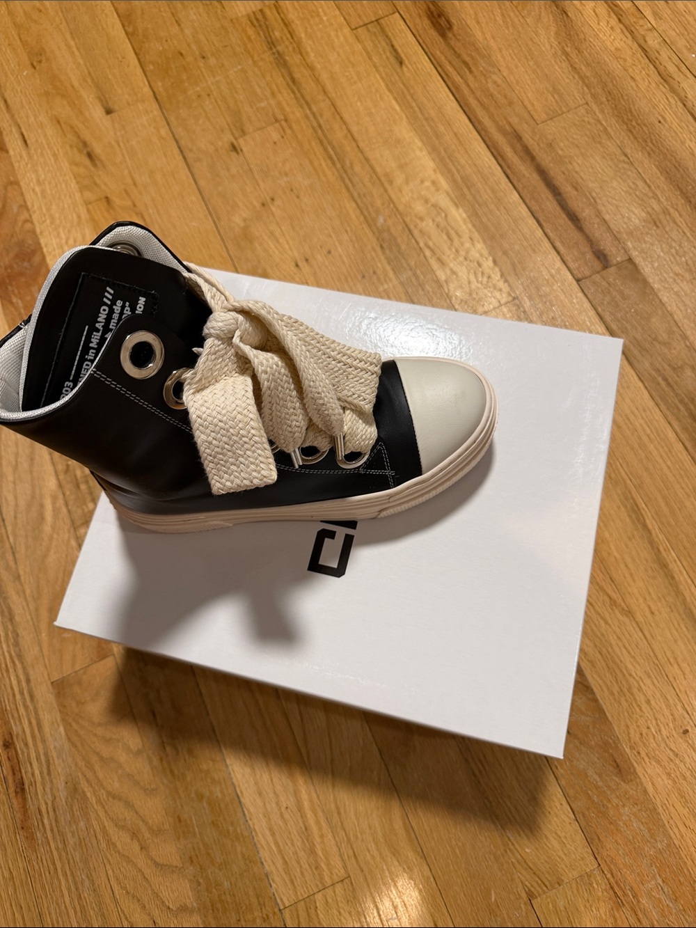 High-Top Women’s Sneaker in Black and Cream
